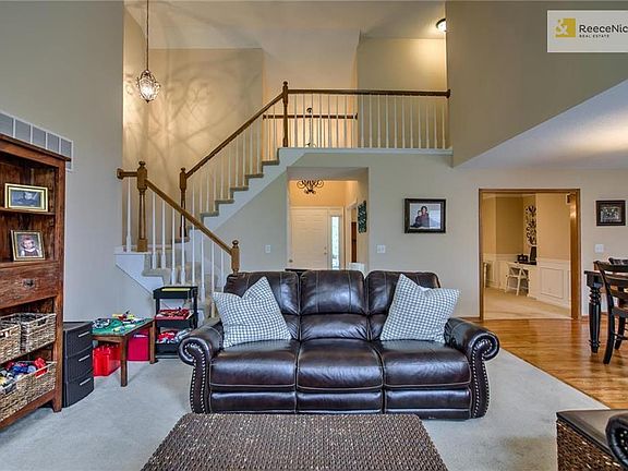 Open staircase to the second floor. Nice open floor plan.