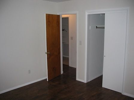 Bedroom with hardwood floors