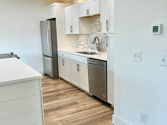 Plenty of kitchen storage and stainless steel appliances.