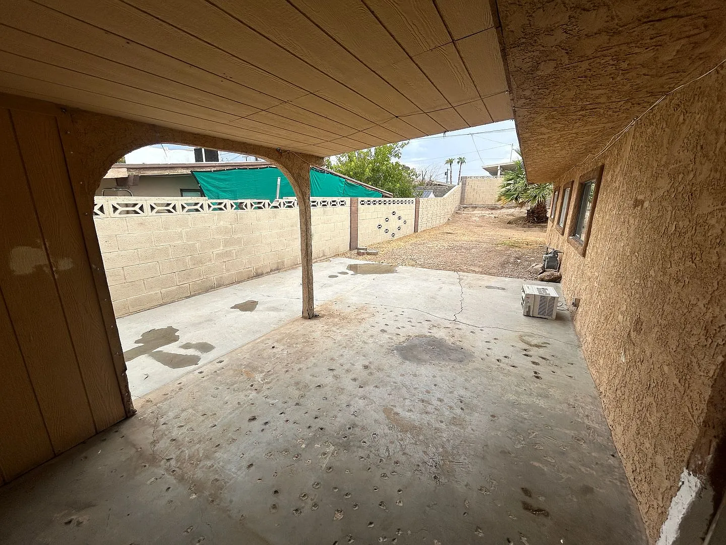 Single story home with large backyard and huge carport with plenty of storage. — Photo 3