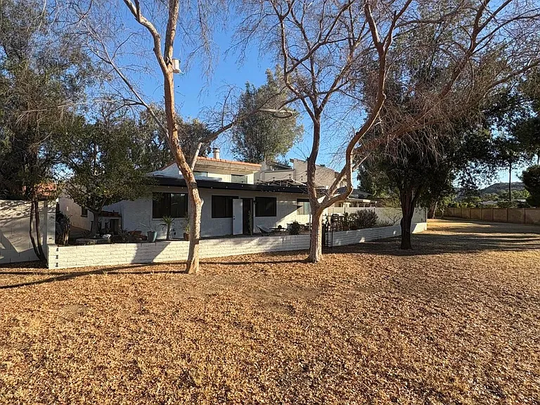 From the green space, looking at the backyard & house