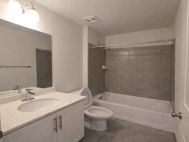 19 - Third floor hallway shared bathroom view_12242025