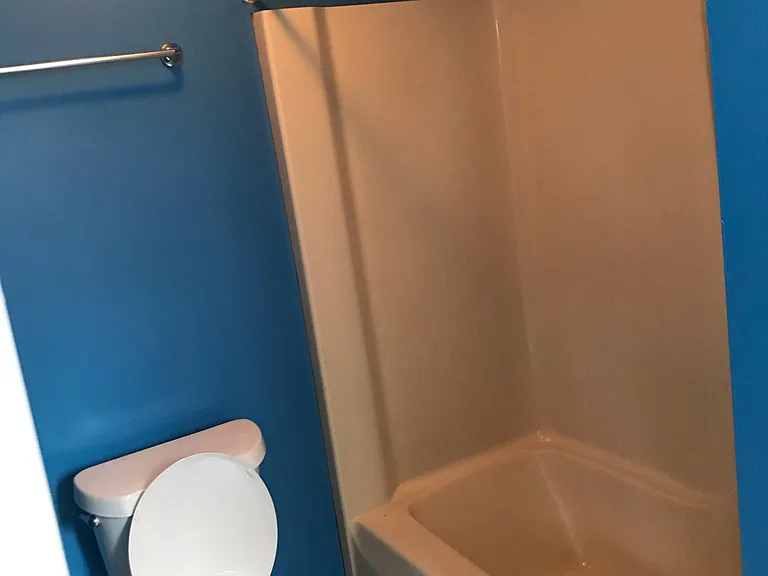 Full bath. Located off bedroom.