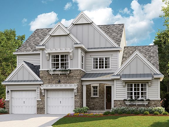 Monterey - American Cottage e 2-Car Front Load Garage Note Renderings may show optional featu