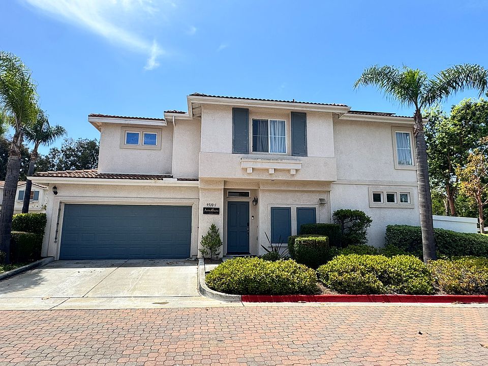 front view with driveway parking