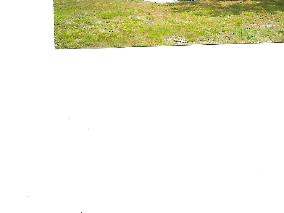 2 br mobile home on large private lot. Not in a park.