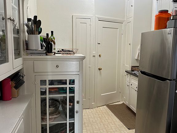 kitchen (stove is on the other side of the cabinet)