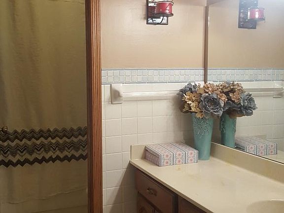 Upstairs bathroom with vanity