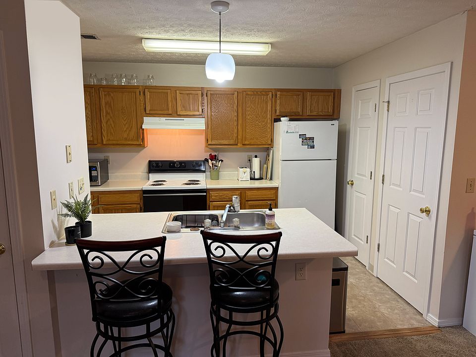 Kitchen - showing doors to pantry and utility closet on the right.