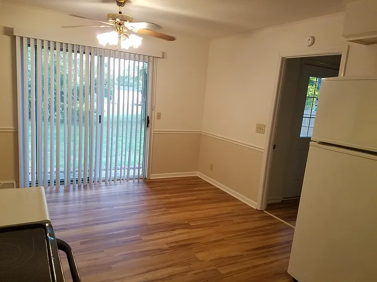 Dining area with sliding glass door to back patio and new fl
