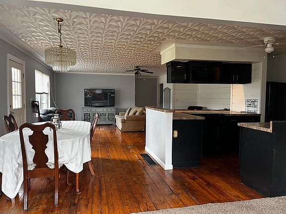 Open Kitchen / Living Room concept with rustic hardwood floors (original bourbon warehouse floors)