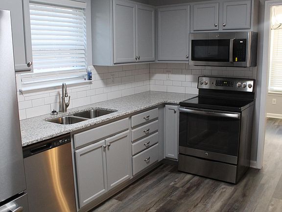 Galley kitchen with stunning finishes