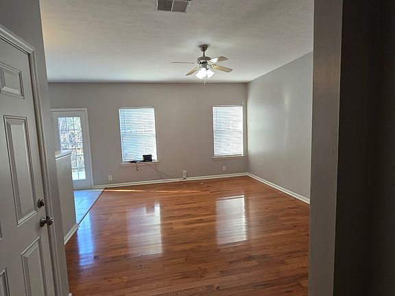 Living room/dining room, first floor, door to garage