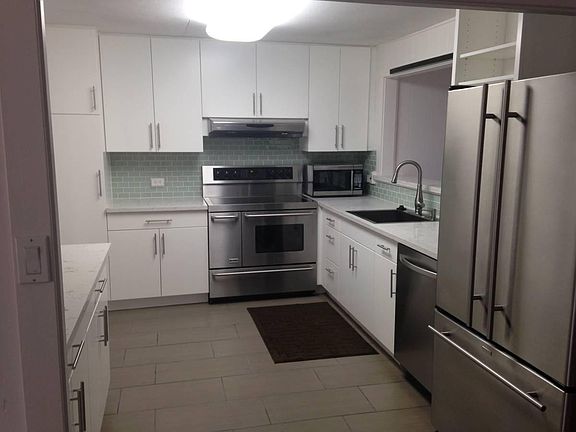 Kitchen with custom cabinets and upgraded features