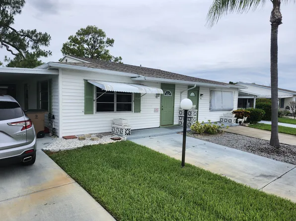 15 Dawn Flower Cir, Lehigh Acres, FL 33936