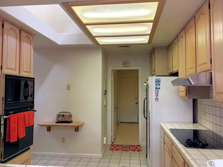 Kitchen looking into Laundry Room