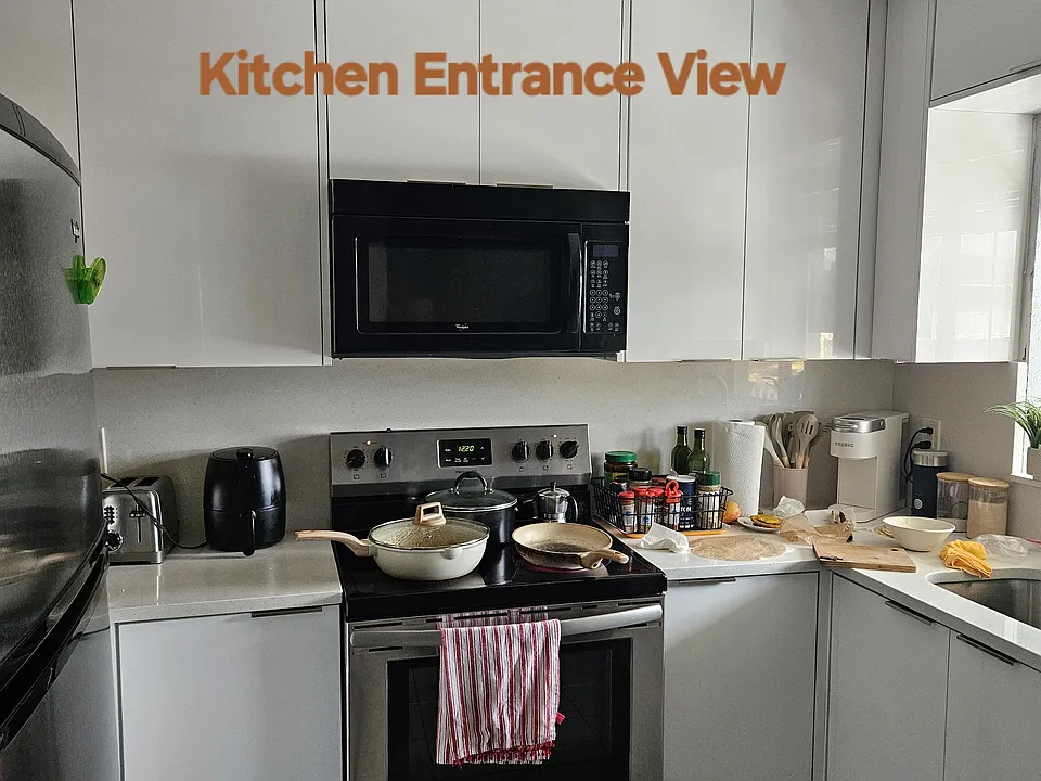Kitchen Entrance View
Stainless Steel Range. Built in Microwave Oven