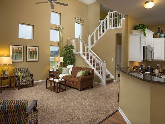 A wall of windows bring tons of natural light into this open floor plan. A spacious great room right