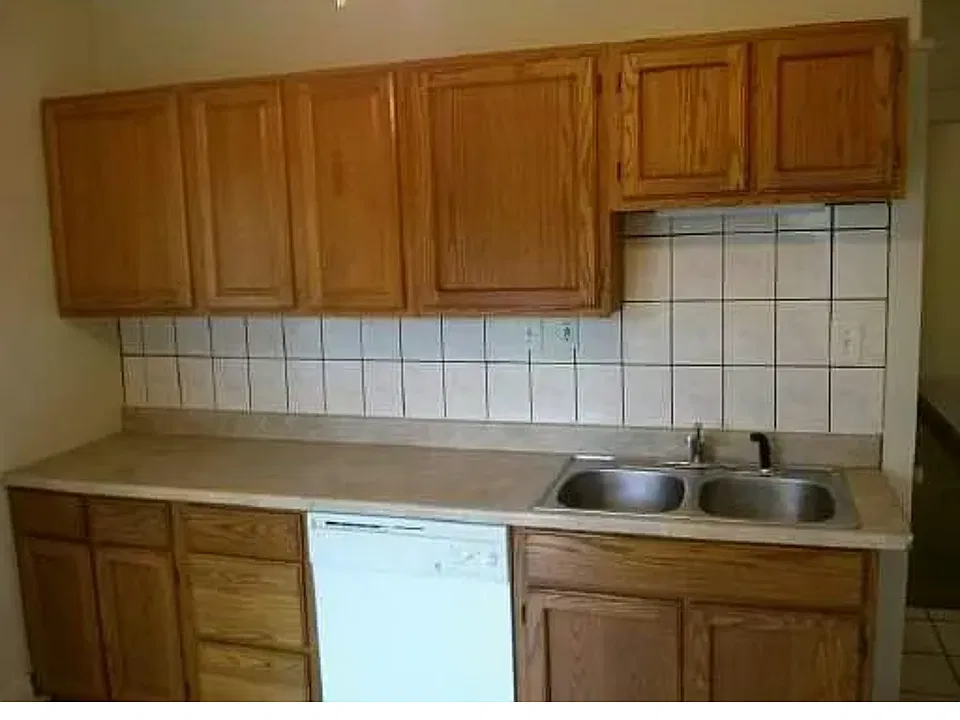 very spacious kitchen with dishwasher and disposal