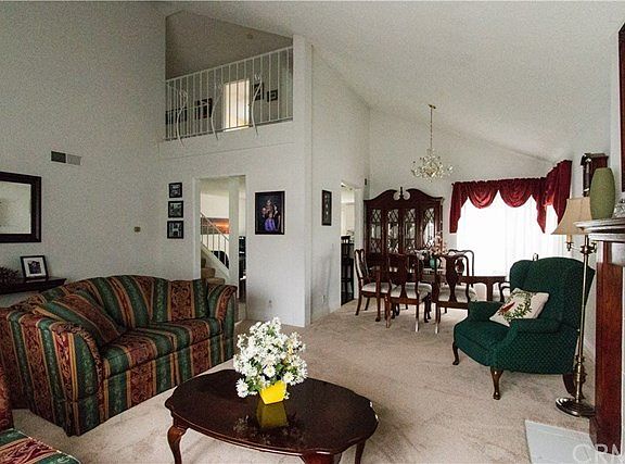 Living room looking toward the dining area and balcony