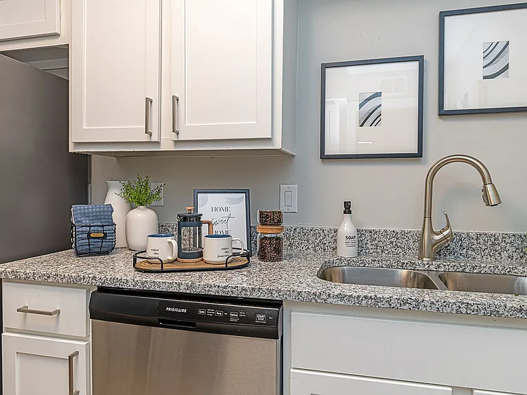Kitchen with granite counters and stainless appliances