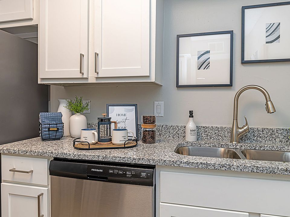 Kitchen with granite counters and stainless appliances