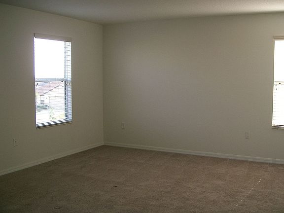 Large family next to large kitchen