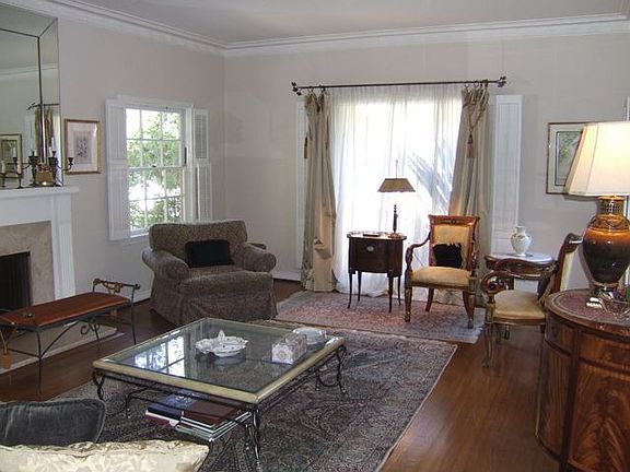 Living room w/ large windows