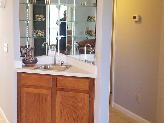 Wet Bar in Living Room & Dining Room. Convenient for relaxing & entertaining