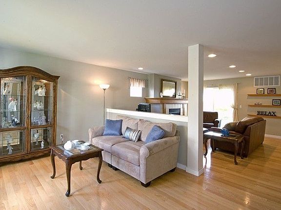 Hardwood floors throughout living room and family room