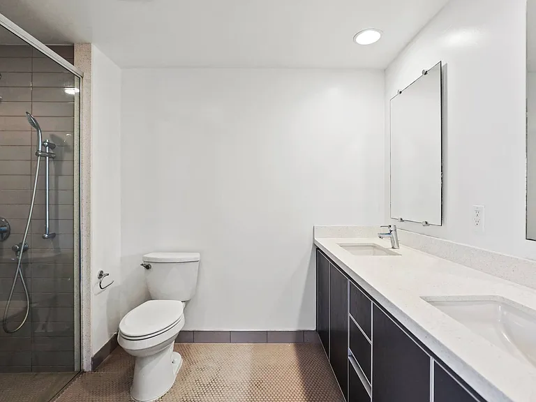 Bathroom with Double-Sink Vanity and Walk-In Shower