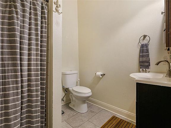 En suite bathroom for primary bedroom. Each bedroom has its own bathroom.