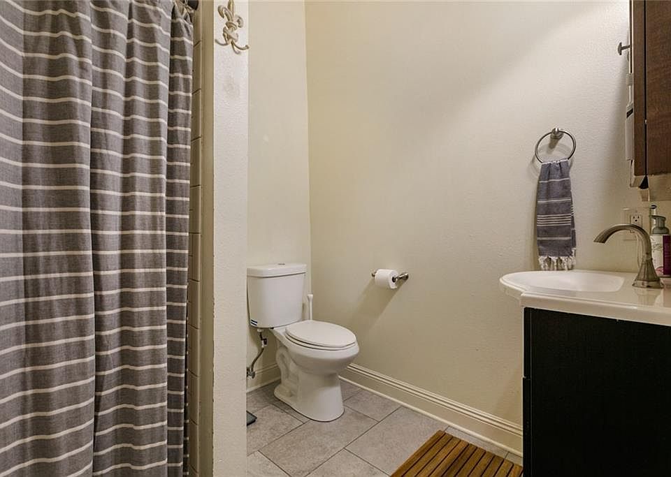 En suite bathroom for primary bedroom. Each bedroom has its own bathroom.