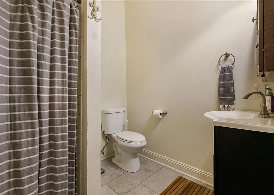En suite bathroom for primary bedroom. Each bedroom has its own bathroom.