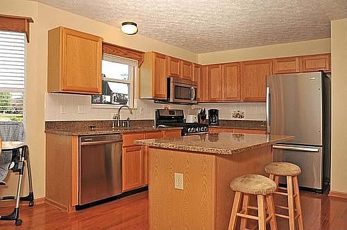 Kitchen features new granite countertops and Stainless Steel Appliances