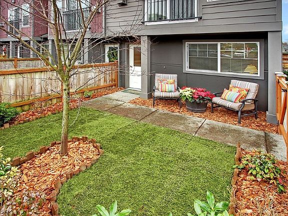 Beautiful end unit with fully fenced front courtyard.