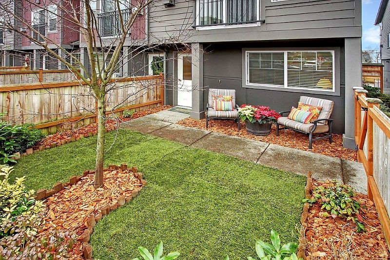 Beautiful end unit with fully fenced front courtyard.
