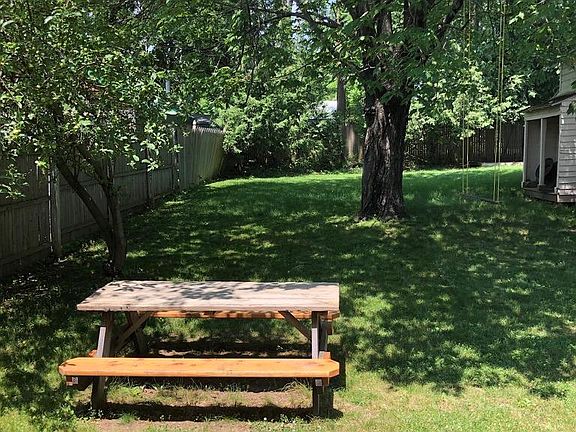 Quiet backyard for summer enjoyment. The large maple tree is magnificent in the Fall.
