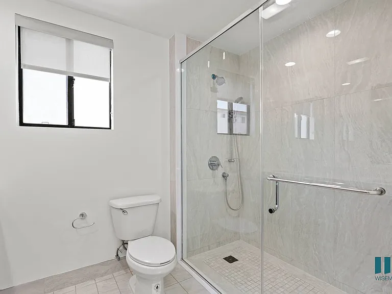 Bathroom with Large Walk-In Shower with Glass Door