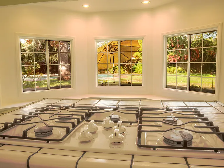Breakfast nook bay window overlooking huge backyard.