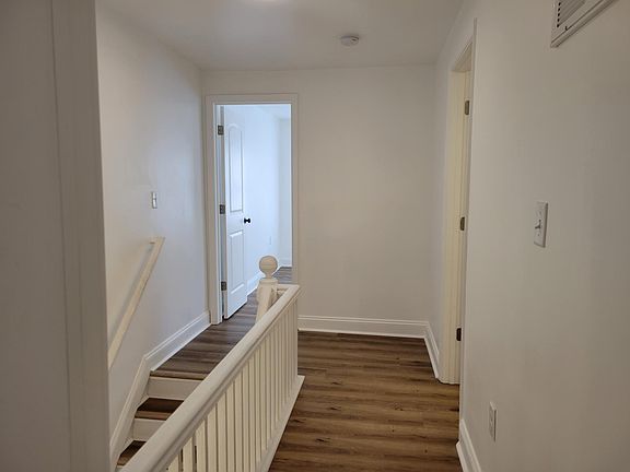 2nd level offers front bedroom, rear bedroom and bath w/laundry in between