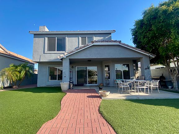 The backyard is incredibly spacious and has so much to offer! With plenty of seating for you and your guests, you can enjoy your favorite cocktail and relax in this outdoor oasis.