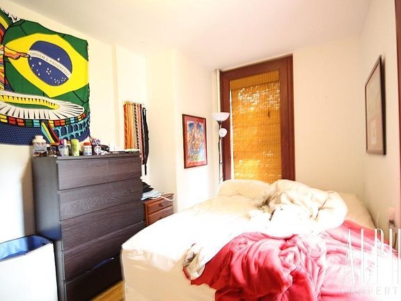 3rd image of 138 E 3rd St APT 3A