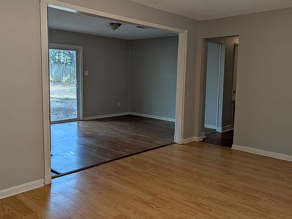 VIEW FROM LIVING ROOM TO DINING