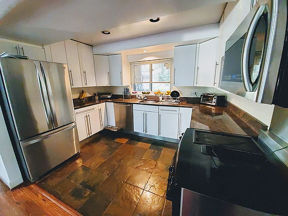 Remodeled stainless kitchen.