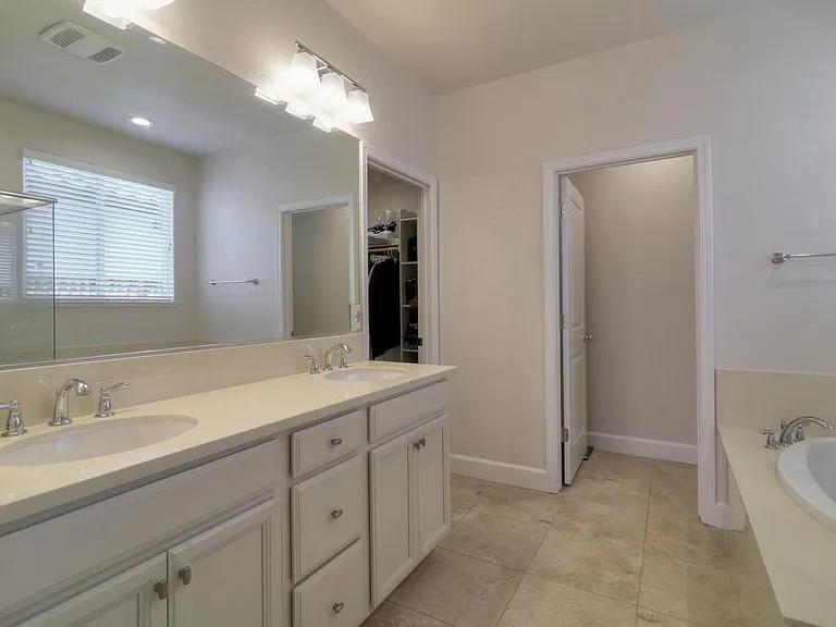 Well-appointed dual person bathrooms.
