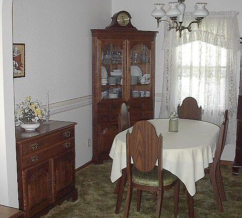 Dining room- hardwood protected by same thick carpeting