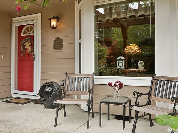 Another view of the front porch with fresh flowers from the garden.