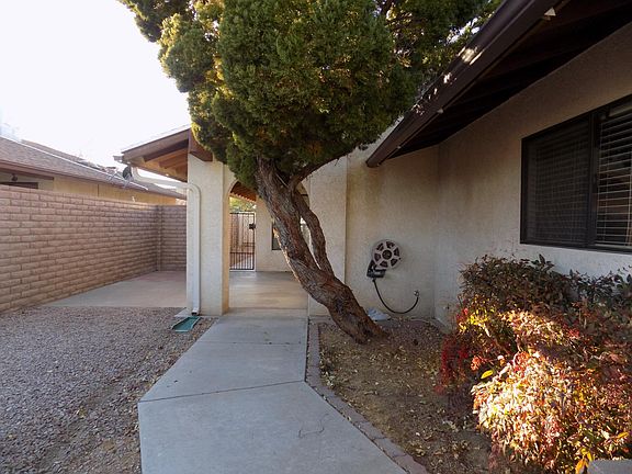 Fenced front courtyard.