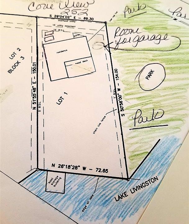 Old survey.  Community park is next door to residence. Room for a garage of carport. Big back yard!